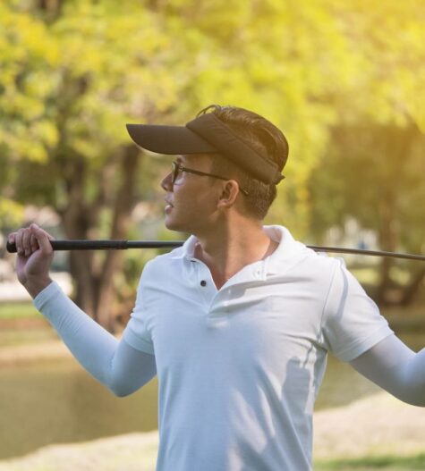 portrait-of-asian-young-male-golfer-with-golf-club-2021-09-04-10-57-05-utc (1)